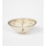 Sheila Fournier (1930-2000) a porcelain footed bowl with pierced rim, inlaid bronze linear design