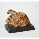 Stella Crofts (1898-1964) Cheetah and Cubs, 1929 stoneware figure group, glazed in colours incised