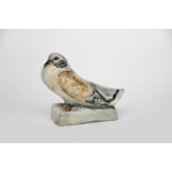 Stella Crofts (1898-1964) Pigeon, 1950 a stoneware figure, painted in colours, with over glaze