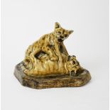 Stella Crofts (1898-1964) Tiger Cubs, 1930 stoneware figure group, glazed in colours incised