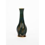 A Martin Brothers stoneware Gourd vase by Edwin and Walter Martin, twisted form, covered in a