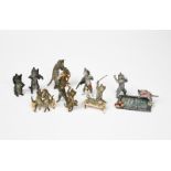 Nine Austrian cold painted bronze cat figures, comprising, two swimming in a pool, a cat sitting