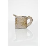 Emmanuel Cooper OBE (1938-2012) stoneware jug form pitted lavender on tan impressed seal mark