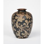 A Martin Brothers stoneware vase, shouldered form, incised with scrolling foliage in buff on a brown