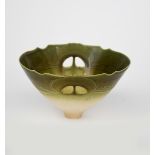 Peter Lane (born 1932) a porcelain footed bowl, the flaring body with irregular rim and pierced