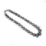 A black cultured pearl necklace, designed as a single row of black cultured pearls, diameters