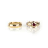 David Ashton, a ruby and diamond ring, the circular-cut ruby rubover-set in 18ct gold with a