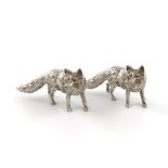 A pair of novelty silver fox salt and pepper pots, maker's mark G.I.P, London 2002, modelled in