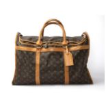 Louis Vuitton, a monogram 'Sac Chaussures' travel bag, the monogram canvas with double brass zip,