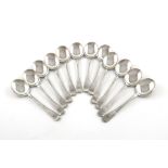 By Tiffany and Co., a set of twelve American silver Fiddle and Thread pattern soup spoons,