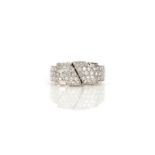 A diamond ring, the front of ribbon scroll design, pavι-set with brilliant-cut diamonds, size P,
