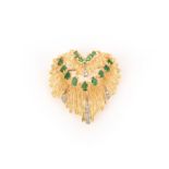 An emerald and diamond-set gold brooch, pierced and set with graduated pear-shaped emeralds and