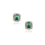 A pair of emerald and diamond earrings, each designed as a cluster, the centres each set with a