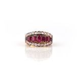 A ruby and diamond half hoop ring, set with five graduated oval-shaped rubies within a border of