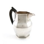 A silver jug, by George Nathan & Ridley Hayes, Birmingham 1911, of hexagonal form, reeded rim and