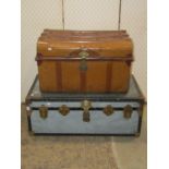 A vintage overpond fibre and reinforced trunk with metal fittings together with a Victorian tin