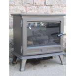 A Dimplex electric log effect fire/heater model SNG20