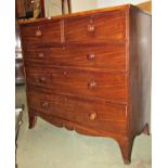 A 19th century mahogany bedroom chest of two short over three long graduated drawers with shaped