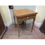 An inlaid Edwardian mahogany envelope card table of usual form, set over a single frieze drawer,