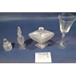 A collection of glass wares comprising cut glass decanters, claret jug with loop handle, 19th