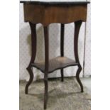A 19th century walnut veneered work/sewing table, the hinged lid with serpentine outline and cube