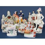 A collection of 19th century Staffordshire figure groups including The Duke of Cambridge, The