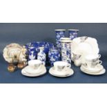 A collection of oriental ceramics including a pair of vases of cylindrical form with four