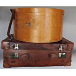 A large leather vanity/dressing case, fitted with a collection of silver topped glass bottles and