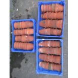 A quantity of approximately 70 small terracotta flower pots (AF), the largest approximately 10 cm in