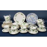 A collection of Colclough Ivy pattern wares including milk jug, sugar bowl, pair of cake plates,
