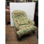 A Victorian drawing room chair on turned supports, recently reupholstered in a button back floral