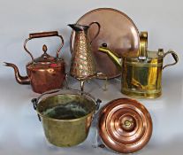 Copper and brassware collection including a copper kettle, jug and a hot water bottle and tray,