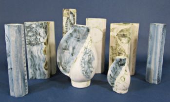 A collection of eight Carn Pottery Cornish studio pottery vases, all signed and numbered by John