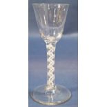 A Georgian bell shaped wine glass with latticino stem, raised on a circular foot