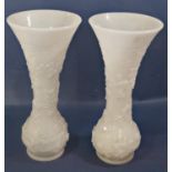 A pair of trumpet shaped white ground Peking glass vases, with moulded fruiting vine detail, 40cm