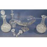 A collection of 19th century cut glass decanters, centre bowl of oviform shape on turned foot (