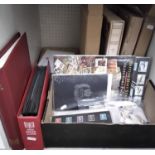 A mixed collection of items to include an album containing a quantity of British stamps, an album