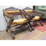 A pair of 19th century Italian walnut X framed chairs of open construction with geometric carved