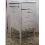 A painted freestanding chest of seven graduated drawers with single strip locking mechanism,