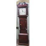 A Georgian oak longcase clock, the trunk with reeded and canted corners, the hood with further