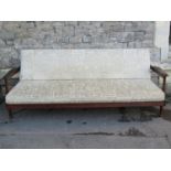 A 1960s Guy Rogers 'Manhattan' Afromosia three piece suite comprising three seat sofa/bed with re-