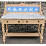 A late Victorian washstand with later painted finish, marble top with raised tiled splashback,