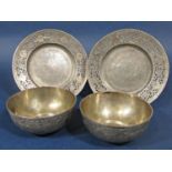 A group of late 19th century Persian Zolotnik '84 silver comprising two finger bowls and two plates
