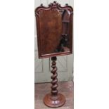 A mid-Victorian period mahogany toilet mirror with adjustable framework, the tapering spiral twist