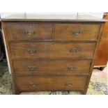 An Edwardian ashwood chest of three long and two short drawers, with original pierced brass