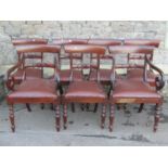 A set of six (4&2) mahogany bar back dining chairs with drop in leather seats, raised on turned