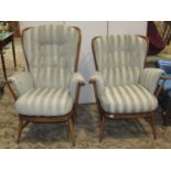 An Ercol Windsor range hoop and stickback three piece suite with stained beechwood frames,