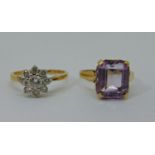 Two 9ct gem set dress rings; an amethyst example and a silver set CZ example, 5g total