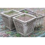 A pair of reclaimed garden planters of square tapered form, with repeating lattice panels, 30cm