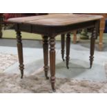 A 19th century oak pull out extending dining table, the rectangular top with moulded outline and